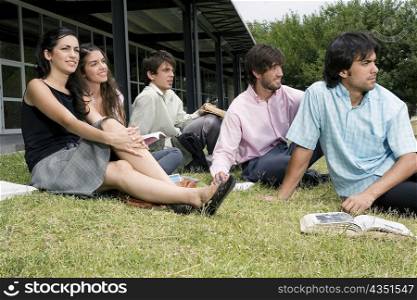 University students sitting in a lawn