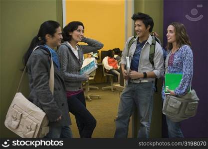 University students standing together in a corridor