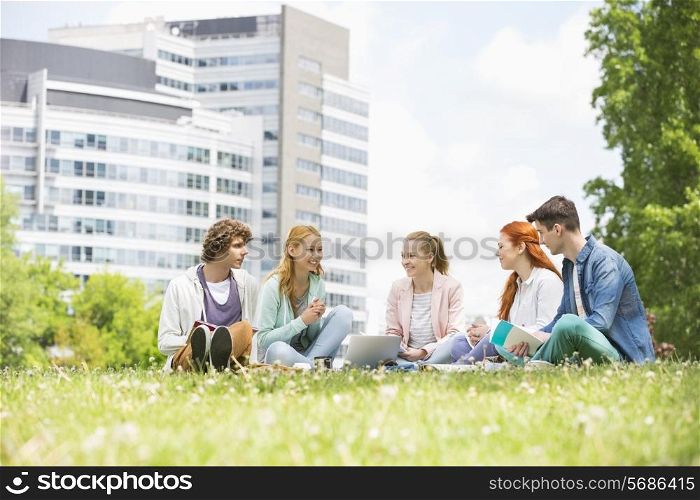 University students studying together on campus ground