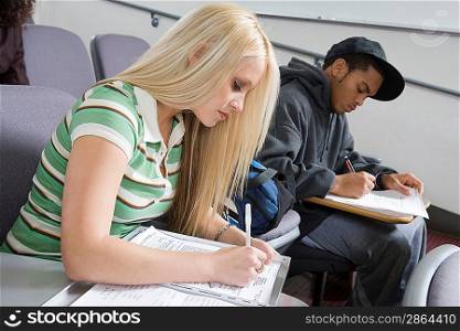 University students working in lecture hall