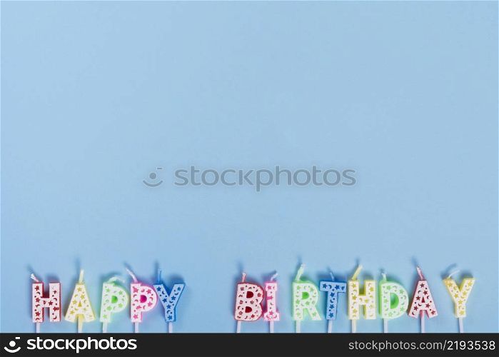 unlit birthday candles with letters