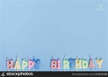 unlit birthday candles with letters