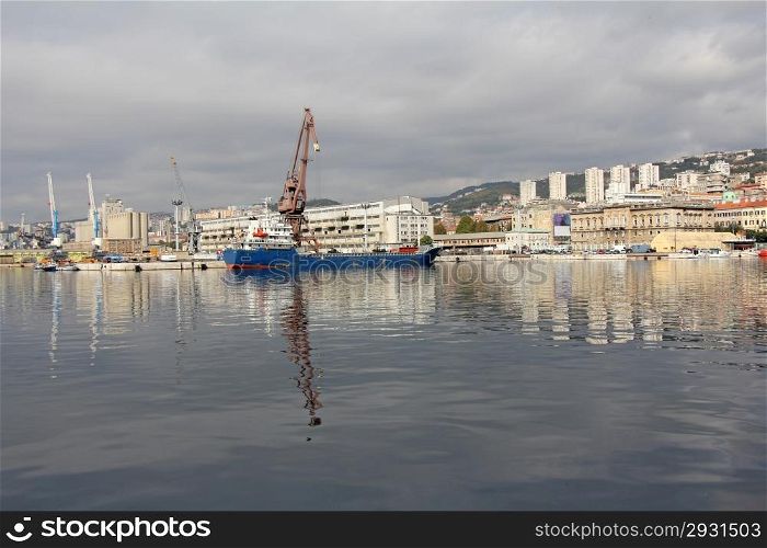 Unloading blue ship in the port of Rijeka Croatia
