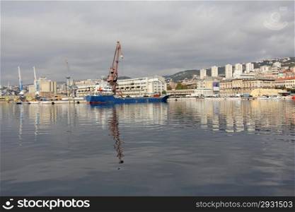 Unloading blue ship in the port of Rijeka Croatia
