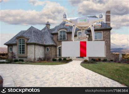 Unmanned Aircraft System (UAV) Quadcopter Drone Delivering Box With Red Ribbon To Home