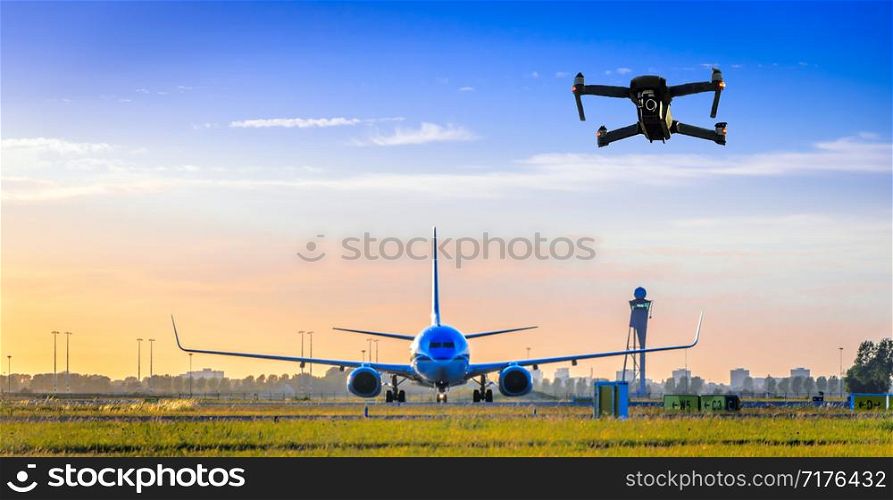 Unmanned drone flying commercial airplanes at airport, flight disruption concept - digital composite.. Unmanned drone flying near airplane at airport
