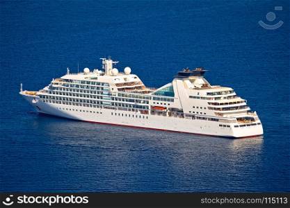 Unnamed cruise ship on blue sea aerial view, Mediterranean sailing