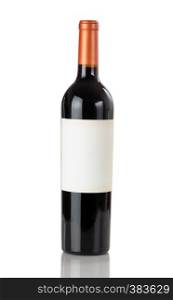 Unopen bottle of red wine isolated on a white background with reflection in close up view