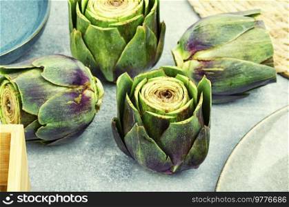 Unopened artichoke buds, healthy food. Italian cuisine, uncooked vegetable. Artichoke fresh vegetables.