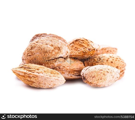 Unpeeled almond heap isolated on white background