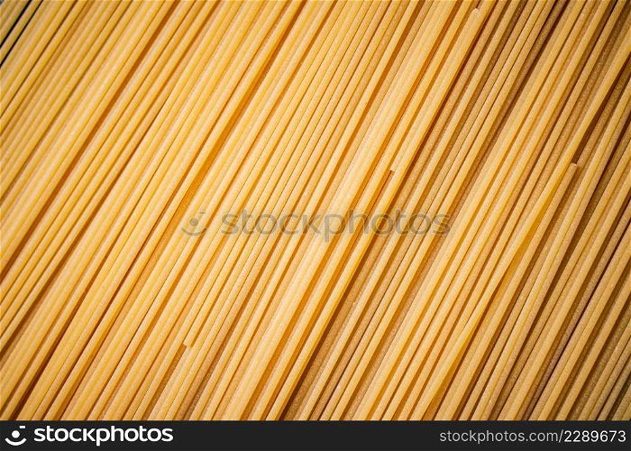 Unprepared spaghetti dry. Macro background. High quality photo. Unprepared spaghetti dry. Macro background.