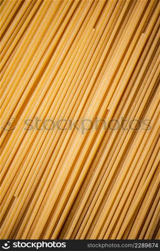 Unprepared spaghetti dry. Macro background. High quality photo. Unprepared spaghetti dry. Macro background.