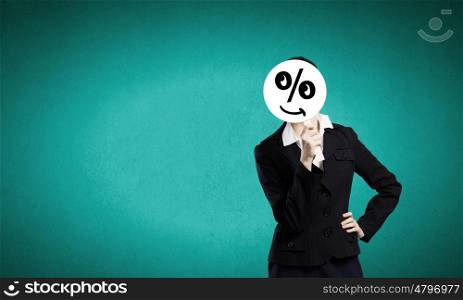 Unrecognizable businesswoman hiding her face behind mask. Businesswoman in mask
