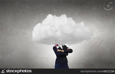 Unrecognizable businesswoman with cloud instead of head