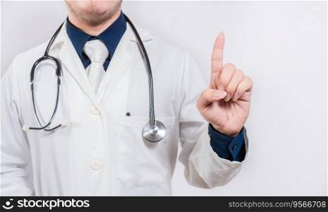 Unrecognizable doctor pointing up. Hand of doctor pointing up. Doctor finger pointing up with text space