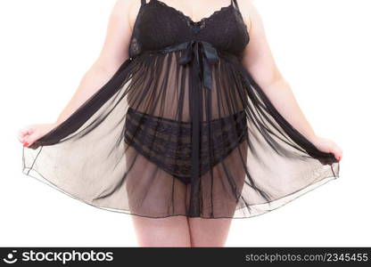 Unrecognizable plus size fat woman wearing black lace lingerie babydoll. Overweight oversized overeating chubby female in underwear clothing.. Woman plus size in lace lingerie babydoll