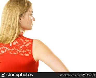 Unrecognizable woman wearing red top with laced detail on back. Fashion, clothing style concept.. Woman wearing red top