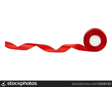 untwisted coil of red satin ribbon isolated on a white background, close up