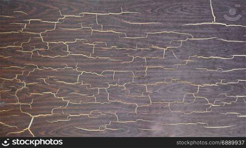 Unusual brown abstract background with beautiful craquelures