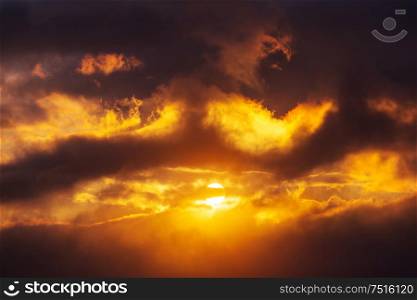 Unusual storm clouds at sunset. Suitable for background.