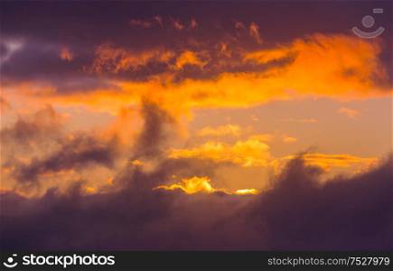 Unusual storm clouds at sunset. Suitable for background.