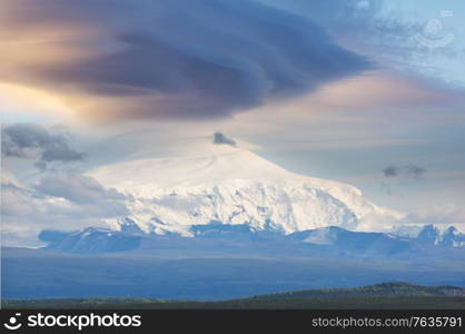 Unusual storm clouds over the mountain peak. Wrangell-St. Elias National Park and Preserve, Alaska.