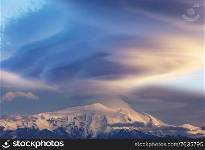 Unusual storm clouds over the mountain peak. Wrangell-St. Elias National Park and Preserve, Alaska.