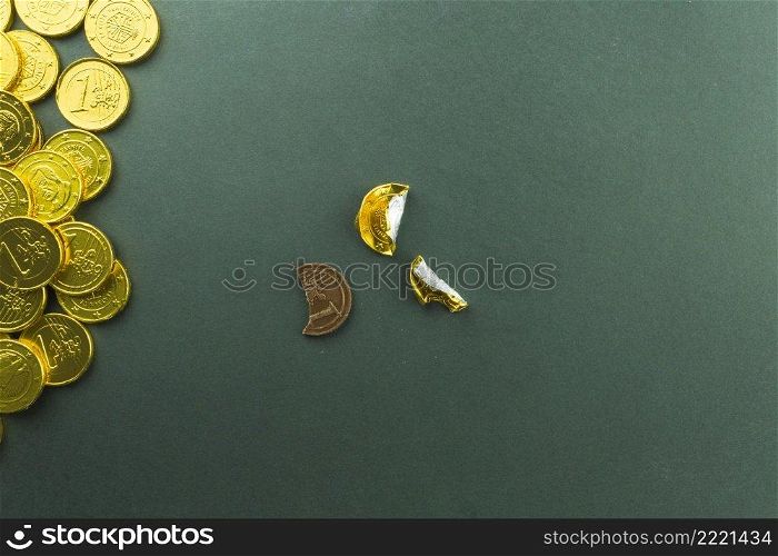 unwrapped treat near pile coins