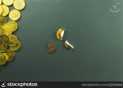 unwrapped treat near pile coins