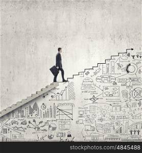 Up the career ladder. Businessman climbing up hand drawn staircase as symbol of career rise