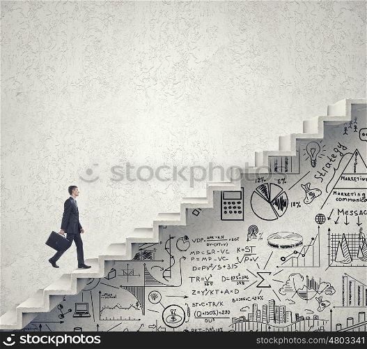 Up the career ladder. Businessman climbing up staircase as symbol of career rise