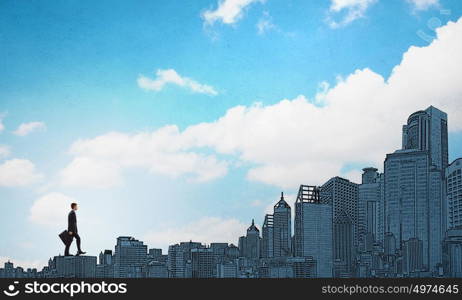 Up the career ladder. Young businessman walking on buildings roofs representing success concept