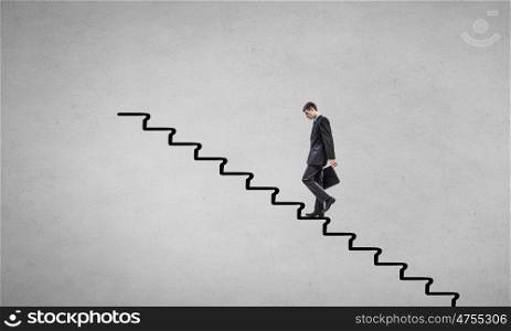 Up the career ladder. Young businessman walking up on ladder representing success concept
