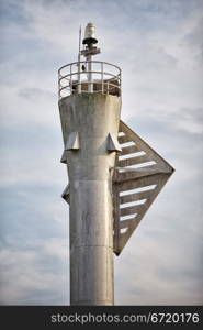 upper part of gray modern metal lighthouse