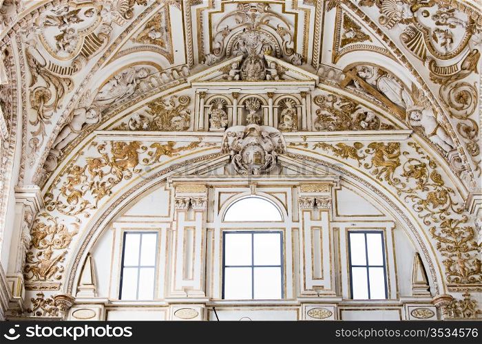 Upper section Renaissance ornamentation of the Mezquita Cathedral in Cordoba, Spain.