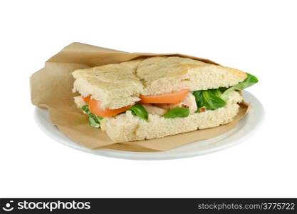 Upscale sandwich with chicken strips on a white background.