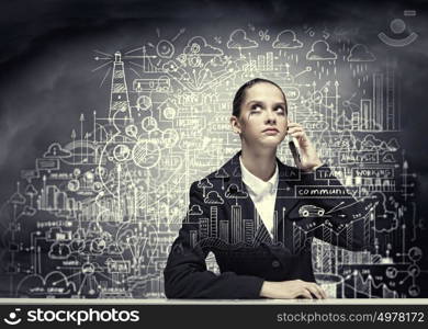 Upset businesswoman. Young upset businesswoman talking on mobile phone