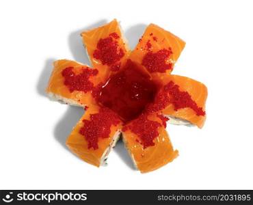 Uramaki roll california isolated on white background. Japanese sushi roll with salmon and red caviar