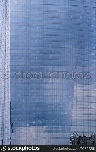 Urban abstract - window facade of business center office building with reflections and colours. Philadelphia PA USA