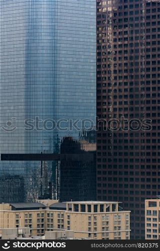 Urban abstract - window facade of business center office building with reflections and colours. Los Angeles CA USA.