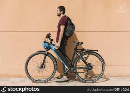 urban cyclist standing e bike