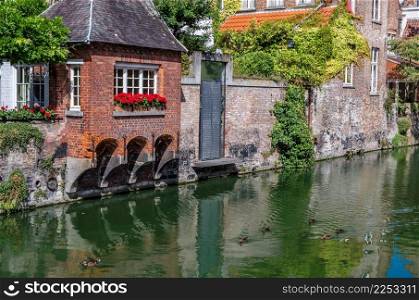 Urban landscape, buildings along the canal in Bruges, Flanders, Belgium