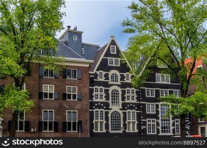Urban landscape, view of streets and typical Dutch architecture in the historical center of Amsterdam, the Netherlands