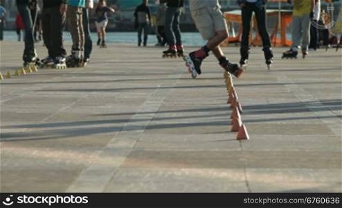 Urban recreation - inline skating on a city embankment