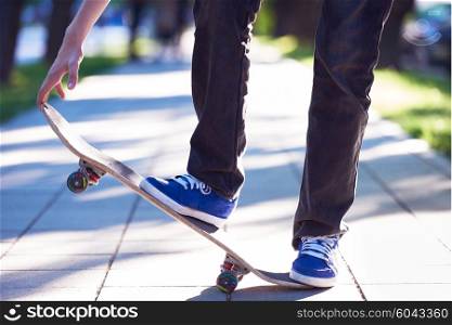 urban scene, closeup of skateboard jump