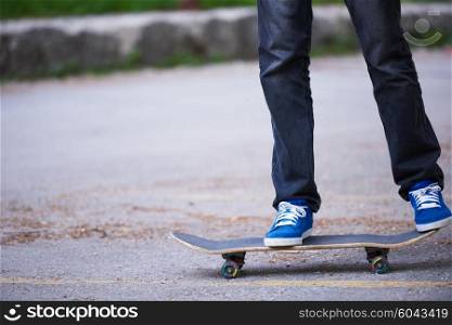 urban scene, closeup of skateboard jump