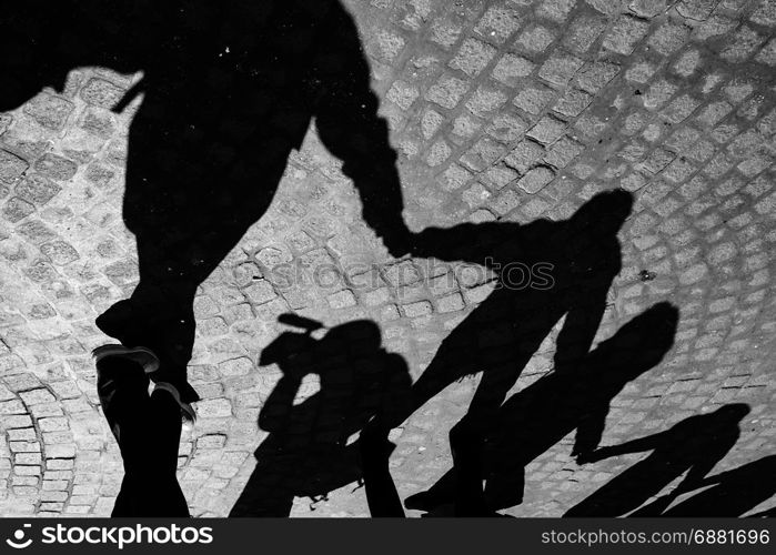 Urban scene of friendship,with shadows in circle, Naples