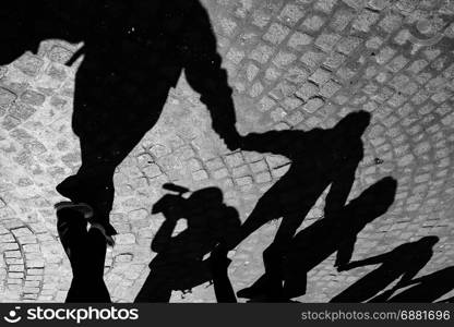 Urban scene of friendship,with shadows in circle, Naples