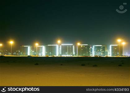 Urban skyline lit up at night
