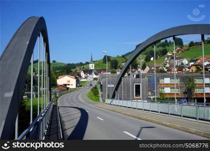 URNASCH, SWITZERLAND - CIRCA JULY 2016 Metal bridge and road